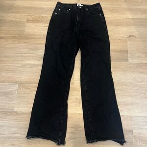 Princess Polly wide leg jeans with distresses bottom.